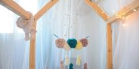 DIY Une attrape rêves en laine pour la chambre de bébé