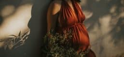 woman standing by the wall
