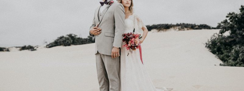 photo of woman holding bouquet