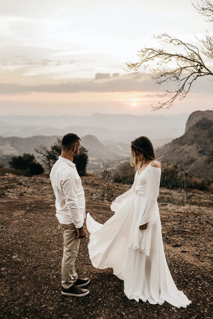 a couple wearing white dress